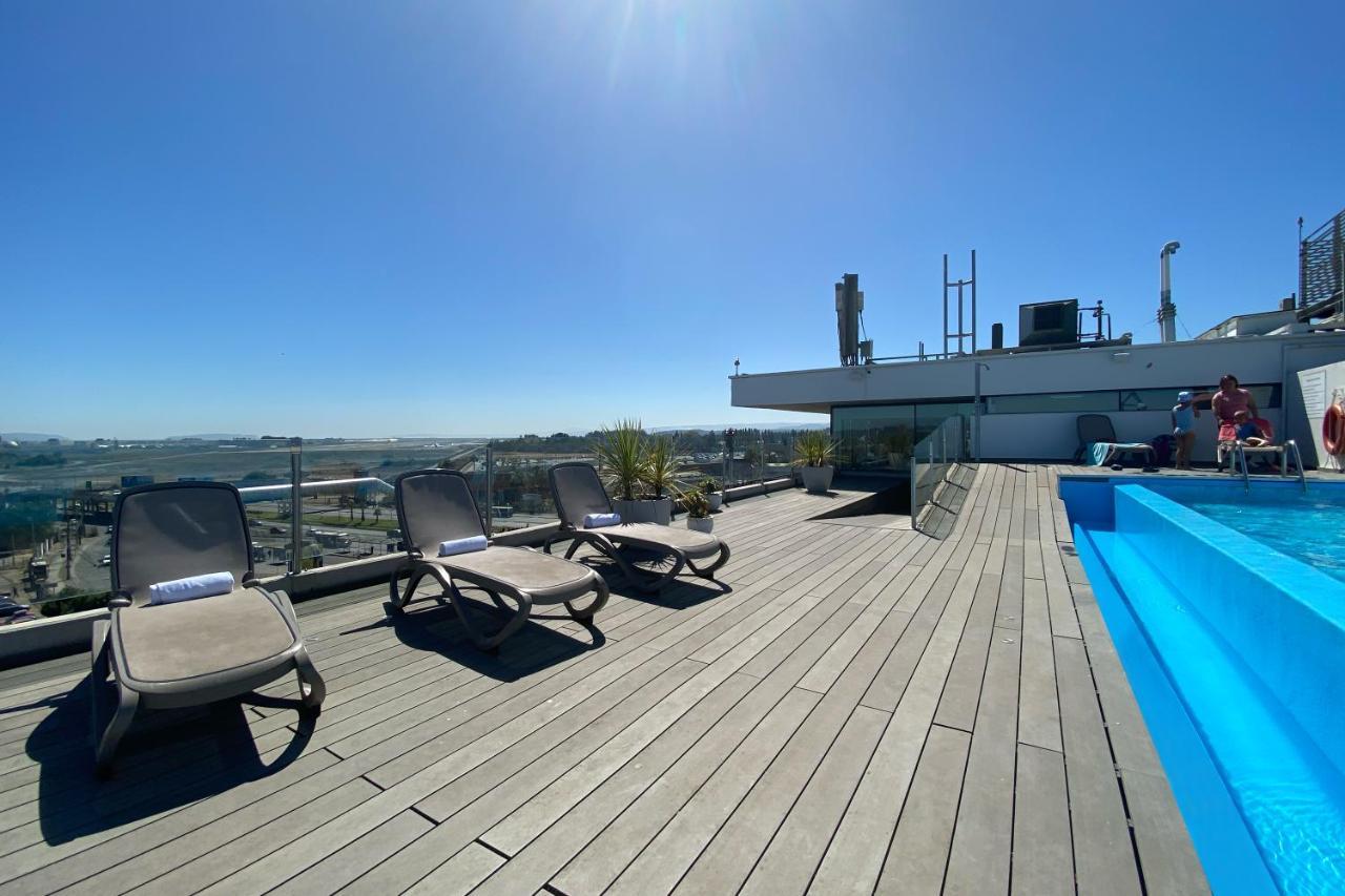 Wyndham Concepcion Pettra Hotel Екстериор снимка Rooftop pool at the hotel