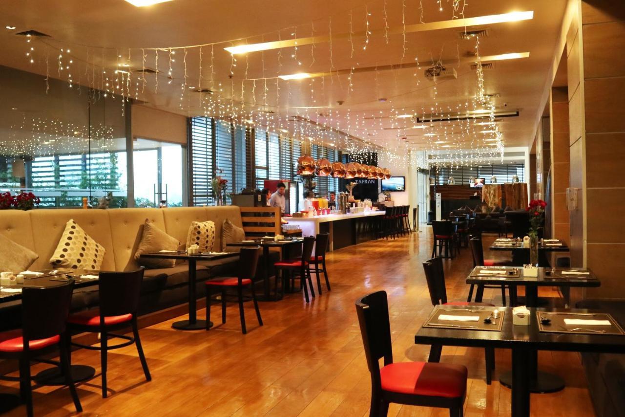 Wyndham Concepcion Pettra Hotel Екстериор снимка The interior of the restaurant